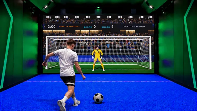 Player preparing to kick a football toward the projected goal in Football Wall Penalty Shootout.